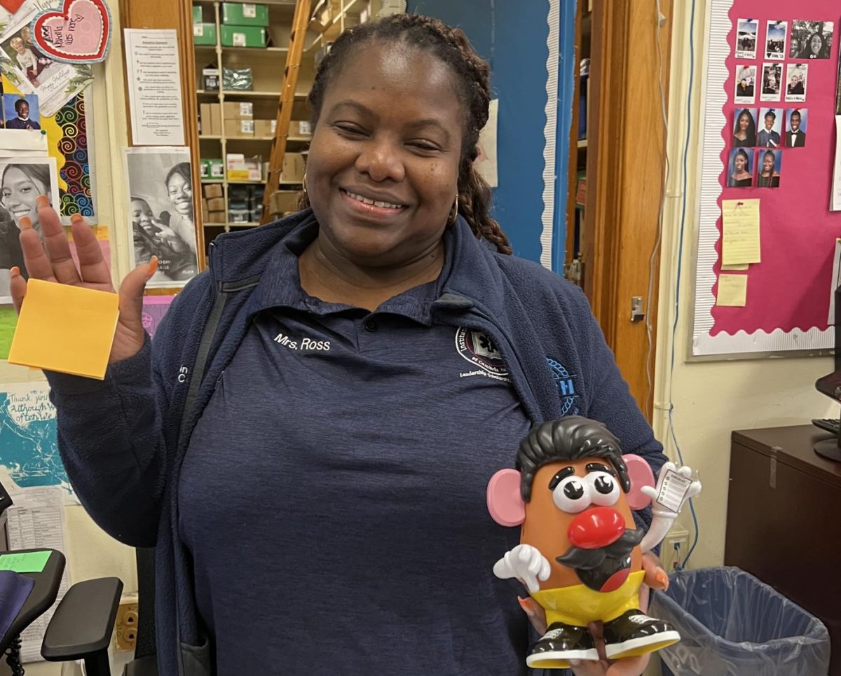 Mrs. Ross and her twin Potato Head!